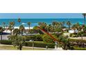 Stunning beachfront property with private beach access and gorgeous views of the ocean and nearby tennis court at 1581 Gulf Blvd # 301N, Clearwater Beach, FL 33767