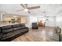 Open floor plan with tile flooring, kitchen, dining area and spacious living room at 3422 Trask Dr, Holiday, FL 34691