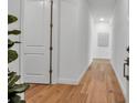 Bright hallway with wood floors, white walls, and a minimalist aesthetic, creating a clean and welcoming entrance at 600 3Rd S Ave # 201, St Petersburg, FL 33701