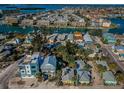 Waterfront neighborhood with a mix of residential buildings, set along scenic canals and waterways at 12409 Gulf Blvd, Treasure Island, FL 33706
