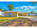 Charming single-story home with a well-maintained lawn and inviting curb appeal at 14136 Payne St, Spring Hill, FL 34609