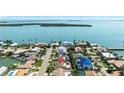 Prime waterfront property boasts stunning bay views and easy access to the open water and beaches at 6129 Leeland S St, St Petersburg, FL 33715