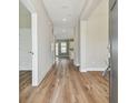 Bright entryway featuring beautiful hardwood floors and neutral paint colors at 1522 W Arch St, Tampa, FL 33607
