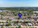 Residential neighborhood with water views close to a beautiful lake at 3338 Hoover Dr, Holiday, FL 34691