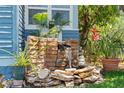 Delightful outdoor water feature surrounded by lush greenery and tropical plants at 701 14Th N St, St Petersburg, FL 33705