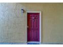 A warm plum front door welcomes you into this inviting residence at 1240 S Missouri Ave # 415, Clearwater, FL 33756