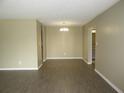 Inviting dining room featuring stylish light fixture and neutral décor at 13289 Arbor Pointe Cir # 201, Tampa, FL 33617