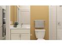 Well-lit bathroom features a white vanity and shower with white subway tiles at 9645 Runaway Breeze Dr, Land O Lakes, FL 34637