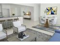 Bright, open-concept living area featuring a dining space and comfortable seating at 2528 Columbus S Way, St Petersburg, FL 33712