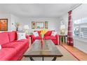 Inviting living room with hardwood floors, bright natural light, and cozy furnishings at 3408 90Th N Ter, Pinellas Park, FL 33782