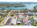 Aerial view of the property near the water, displaying its location, neighborhood, and nearby canals at 3516 Casablanca Ave, St Pete Beach, FL 33706