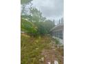 A grassy yard needs a lot of TLC at 5720 21St W St, Bradenton, FL 34207