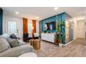 Living room with a cozy seating area, modern decor, and ample natural light at 6225 76Th N Ave, Pinellas Park, FL 33781