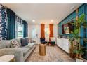 Stylish living room featuring modern furniture, decorative accents, and hardwood flooring at 6225 76Th N Ave, Pinellas Park, FL 33781