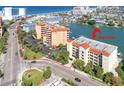 Aerial view showcases this condo's proximity to the beach and harbor, conveniently located near scenic routes at 600 Bayway Blvd # 304, Clearwater, FL 33767