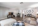 An open-concept living room with modern flooring and ample space for entertaining and relaxing at 6333 Aberdeen Ave, New Port Richey, FL 34653