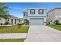 Lovely two-story house featuring a well-manicured lawn and inviting curb appeal at 6648 Seaway Dr, Brooksville, FL 34604
