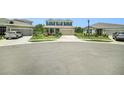 Inviting two-story home with a two-car garage and a well-kept lawn in a serene neighborhood at 18161 Hunters Meadow Walk, Land O Lakes, FL 34638