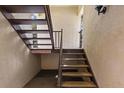 Outdoor stairwell that provides entry to the home at 3600 Magnolia Ridge Cir # 1221-G, Palm Harbor, FL 34684
