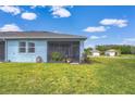 A relaxing screened patio perfect for enjoying the outdoors at 3765 Maxwell Park Dr, Sun City Center, FL 33573
