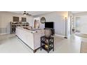 Open-concept living room offers ample space for relaxing and entertaining, lots of natural light at 4340 50Th S Ter, St Petersburg, FL 33711