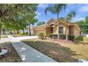 Well-maintained single Gathering home with landscaped yard, and a two-car garage at 4500 Fieldview Cir, Wesley Chapel, FL 33545