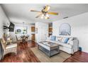 Inviting living room with stylish furnishings, wood flooring, and ample natural light at 5003 Starfish Dr Se # B, St Petersburg, FL 33705