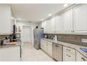 Beautiful kitchen with stainless steel appliances, granite countertops, and ample cabinet space at 5335 Sand Crane Ct, Wesley Chapel, FL 33543
