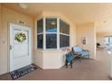 Inviting condo entrance with a cozy seating area and pleasant decor at 6205 Shoreline Dr # 1204, St Petersburg, FL 33708