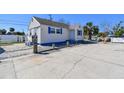 Inviting home with a well-maintained exterior, complemented by ample parking space at 101 146Th Ave, Madeira Beach, FL 33708