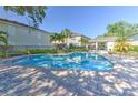 Community pool with inviting blue water and ample lounging space at 3456 High Hampton Cir, Tampa, FL 33610