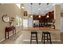 Kitchen with granite countertops, stainless appliances, dark cabinetry, and plenty of natural light at 582 53Rd N Ave, St Petersburg, FL 33703