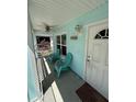 Cozy front porch featuring comfortable seating and a welcoming entrance at 641 N Garden Ave, Clearwater, FL 33755