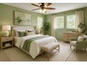 Serene bedroom with ample natural light and tranquil green color scheme at 771 Murphy N Ave, St Petersburg, FL 33703