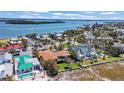 An aerial view showcasing the home's proximity to the water and the serene residential neighborhood at 1058 Eldorado Ave, Clearwater Beach, FL 33767