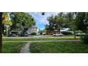 Wide angle street view of attractive neighborhood with a variety of homes at 1069 21St N Ave, St Petersburg, FL 33704