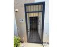 Close-up view of a gated entryway with decorative metalwork and address number for added security at 107 Caldwell Dr # 178M, Brandon, FL 33510