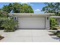 Spacious two-car garage offers ample parking and additional storage space at 301 62Nd S Ave, St Petersburg, FL 33705