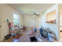 Living room featuring tile floors and white walls at 617 Edenville Ave, Clearwater, FL 33764