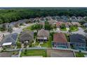 Expansive aerial view of the property, showcasing its location within a residential community at 27231 Liriope Ct, Wesley Chapel, FL 33544