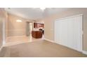 Cozy living room showcases an open floor plan with seamless transition to kitchen area at 4414 Plumosa St, Spring Hill, FL 34607