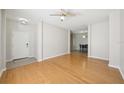 Spacious living area with hardwood floors, providing a bright, open space at 10260 Devonshire Lake Dr, Tampa, FL 33647