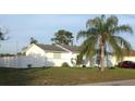 Charming single-story home with a well-maintained lawn and mature trees at 12328 Shafton Rd, Spring Hill, FL 34608
