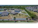 Aerial view of home with a large, enclosed backyard, showcasing its lot size and privacy at 13506 Wild Ginger St, Riverview, FL 33579