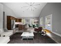 Open-concept living room featuring modern furnishings and abundant natural light at 1708 E 15Th Ave, Tampa, FL 33605