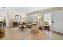 Bright living room with natural light and neutral décor, perfect for relaxation at 2060 Attache Ct, Clearwater, FL 33764