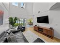 Spacious living room with a water view, high ceilings, and stylish furnishings at 1117 Shipwatch Cir, Tampa, FL 33602