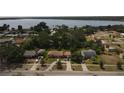 A neighborhood with mature trees and lake views at 1710 26Th S Ave, St Petersburg, FL 33712