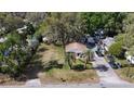 Aerial view of the house shows its large lot size at 38327 Palm Grove Dr, Zephyrhills, FL 33542