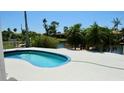 Inviting backyard pool offers a refreshing escape with scenic waterfront views at 5047 Bonito Dr, New Port Richey, FL 34652